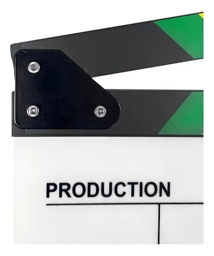 Claqueta de cine en acrílico blanco con detalles en negro y verde.